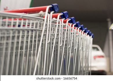 Row of shopping carts. Selective focus