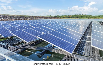 Row of solar cells floating on the water in solar power station