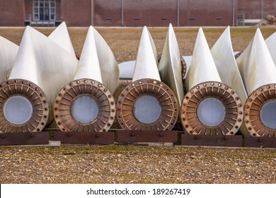 A Row Of Spare Wind Turbine Blades On Wins Turbine Maintenance Yard