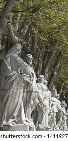 A Row Of Stautes At Palacio Real Madrid