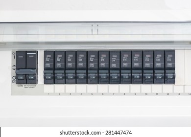 A Row Of Switched Off Household Electrical Circuit Breakers On A Wall Panel