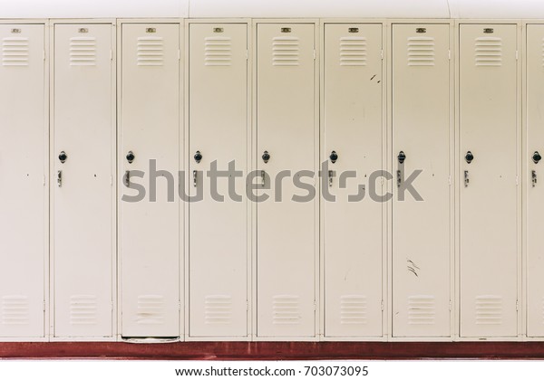 Row of tan school\
lockers