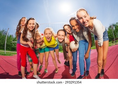 Row of teens standing on the volleyball game court - Shutterstock ID 293291354