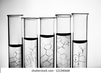 Row Of Test Tubes In Black And White Style.