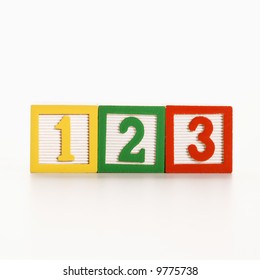 Row Of Toy Building Blocks With Numbers.