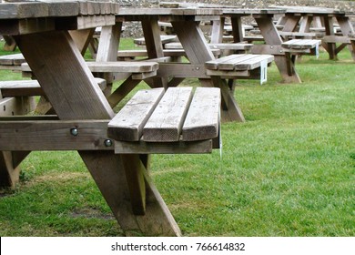 A Row Of Traditional English Pub Benches In A Pub Garden