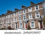 Row of traditional terraced houses in Leyton, East London, England