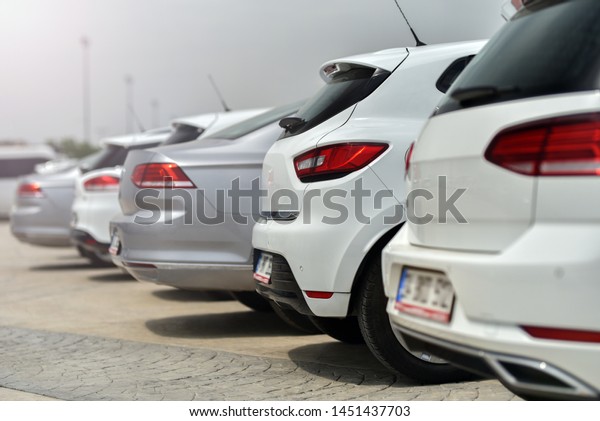 row of training cars\
in driving school