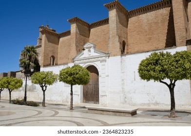 Row of trees in front of Saint Claire monastery in Moguer, a small city located in the province of Huelva, Andalusia, Spain - Shutterstock ID 2364823235