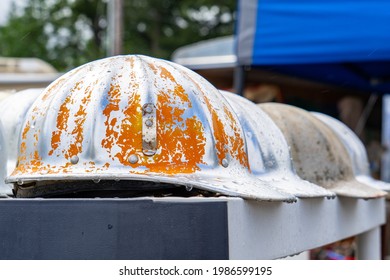 Row Of Vintage Aluminum Hard Hats Worn By Local Construction Or Logging Crew