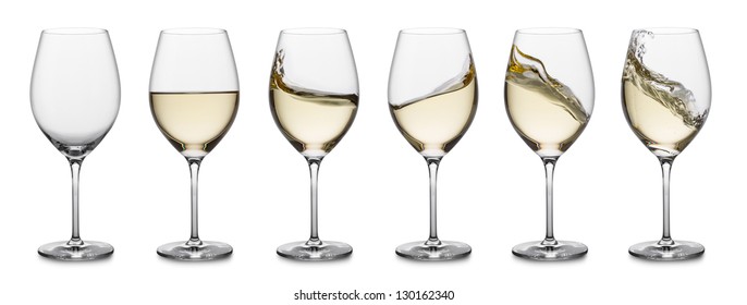 Row Of White Wine Glasses, Full, Empty And With Splashes.