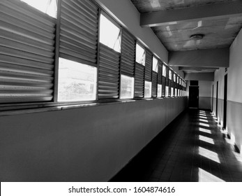 a row of windows alongside a corridor