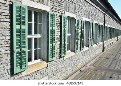 Row of windows in a brick wall