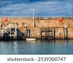 Rowboat docked at Warrnambool Breakwater, Lady Bay, Warrnambool, Shipwreck Coast, Great Ocean Road, Victoria, Australia