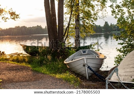 Rowboats line the waterways creating peaceful icon summer scenes 