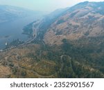 The Rowena Crest Viewpoint looks down on the scenic Columbia River Gorge separating Washington and Oregon. The area is a popular area for hiking, biking, fishing, and water sports.