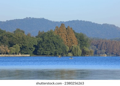 Rower Practicing in West Lake, Hangzhou, China - Powered by Shutterstock