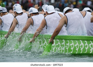 Rowers Working Hard On A Dragon Boat Race