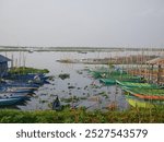 rowing boat on a lake in Indonesia.