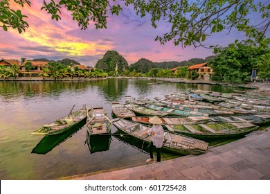 Rowing boat Waiting for passengers at sunrise,Hoa Lu Tam Coc,Hoi An Ancient Town,Vietnam.