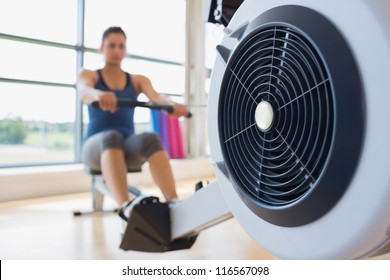 Rowing Machine Being Used In Fitness Studio