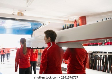 Rowing team carrying scull from boathouse - Powered by Shutterstock