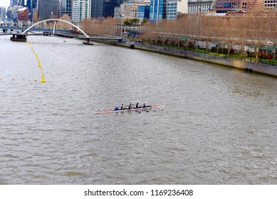 Rowing Team Practices On The River, Sweep Style Rowing.