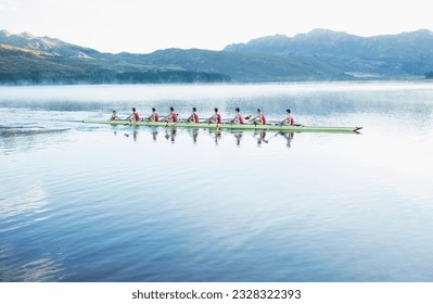 Rowing team rowing scull on lake - Powered by Shutterstock