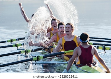 Rowing team splashing and celebrating in scull on lake - Shutterstock ID 2328322411
