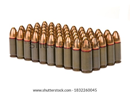 Rows of 45 caliber bullets isolated against a white background.