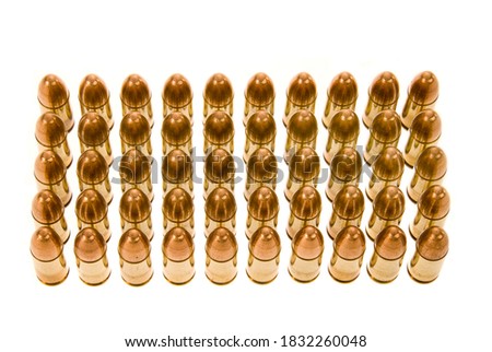 Rows of 45 caliber bullets isolated on a white backgrouns.