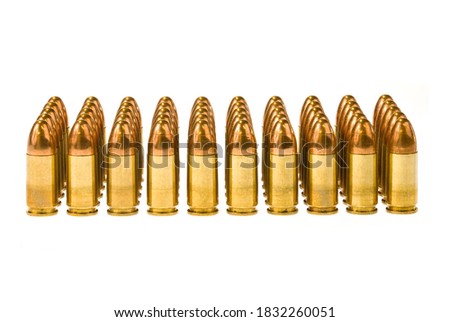 Rows of 45 caliber bullets isolated on a white background.