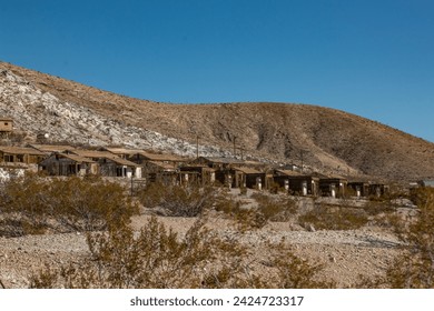 Rows of abandoned old mining cabins in Darwin, CA. 