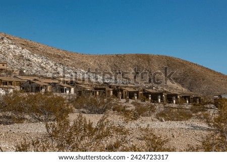 Rows of abandoned old mining cabins in Darwin, CA. 