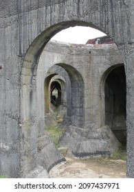 Rows Of Archways In An Old Abandoned Industrial Site.