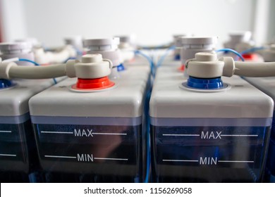 Rows Of Batteries In Industrial Accumulators Room. Battery Pack. Accumulator Connections