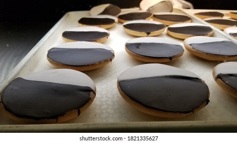 Rows Of Black And White Cookies In Sharp Focus. 