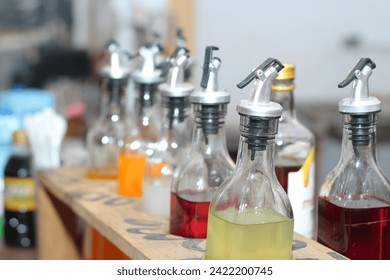 rows of bottles of drinks at the small bar