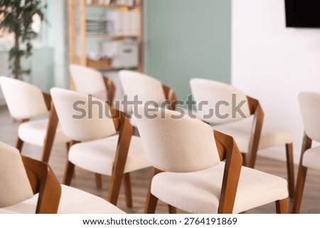 Rows of chairs in empty auditorium. School classroom, lecture hall, additional education, offline lessons