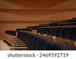 Rows of chairs in empty concert hall