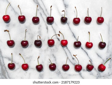 Rows of cherries on marble - Shutterstock ID 2187179223