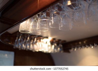 Rows Of Clean Empty Beer Glasses Turn Upside Down On Counter Bar