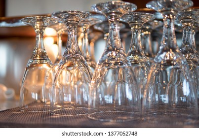 Rows Of Clean Empty Beer Glasses Turn Upside Down On Counter Bar