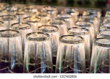 Rows Of Clean Empty  Beer Or Water  Glasses Turn Upside Down On Counter Bar