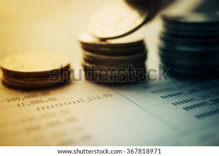 rows of coins and account for finance and banking concept