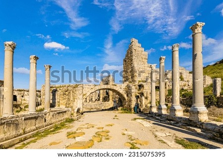 Rows of columns in Perge, Antalya, Turkey. Remains of colonnaded street in Pamphylian ancient city.