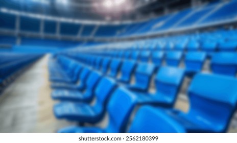 Rows of empty blue stadium seats in a large arena.