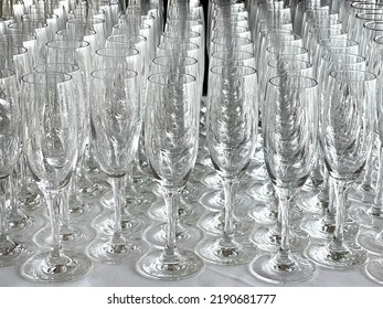 Rows Of Empty Champagne Flute Glasses. No People.