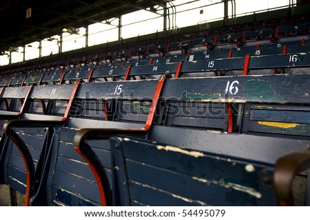 Rows of empty seats in a ballfield