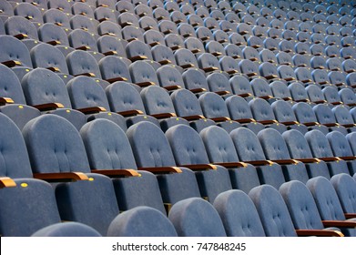 Rows of empty soft armchairs in the conference hall - Shutterstock ID 747848245